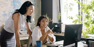 two immigration attorneys researching client management tools for their firm